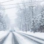 Snowy roads like this can contribute to car-pole collisions